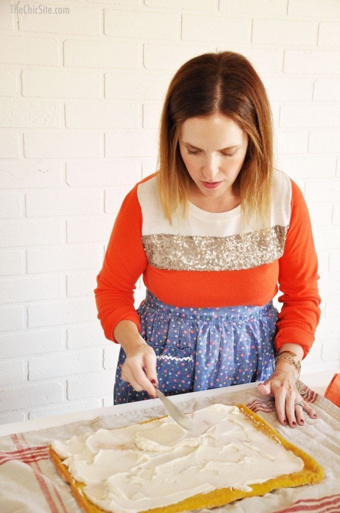 icing a pumpkin roll